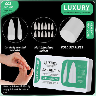 Des ongles de stiletto de taille moyenne 11 tailles à couverture complète, de forme pointue, faux ongles pour les extensions d'ongles